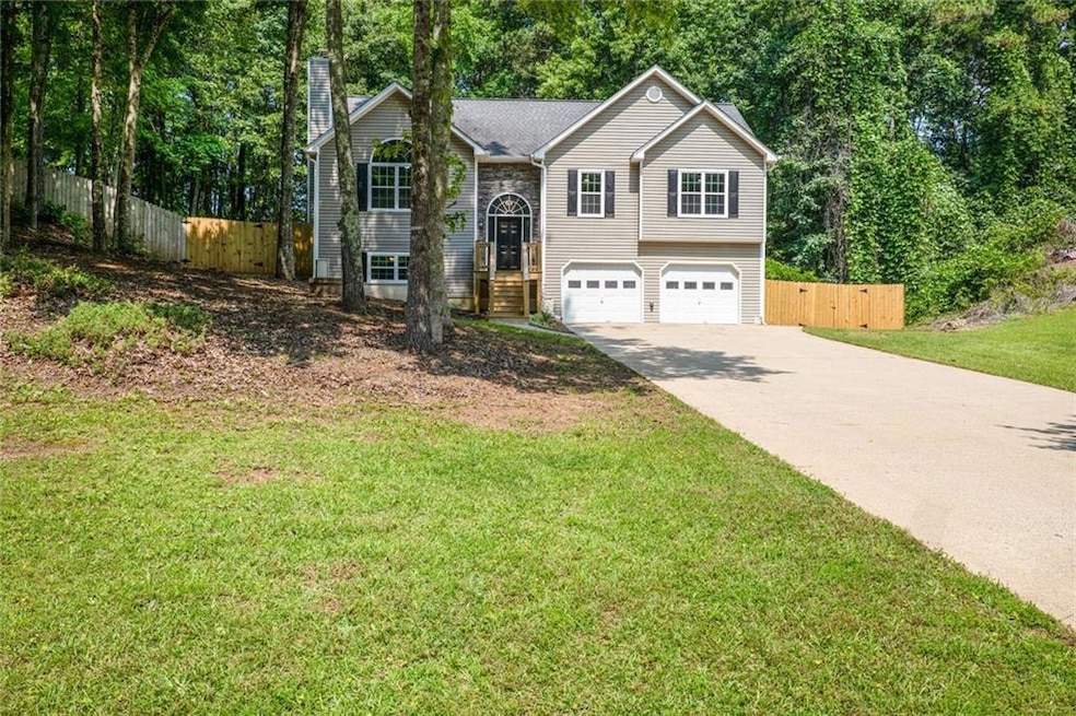 Thoughtfully updated split-foyer home nestled on a spacious and private lot in a peaceful, no-HOA community. The long, level driveway can easily accommodate 6 vehicles.