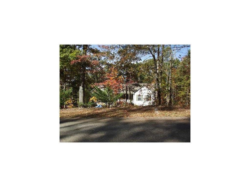Front elevation sits back from the road