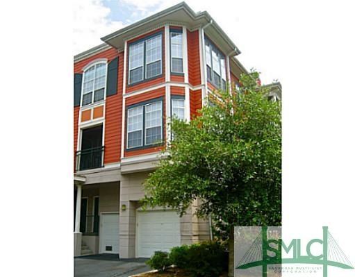 Exterior Front. 3 story townhome with huge two car