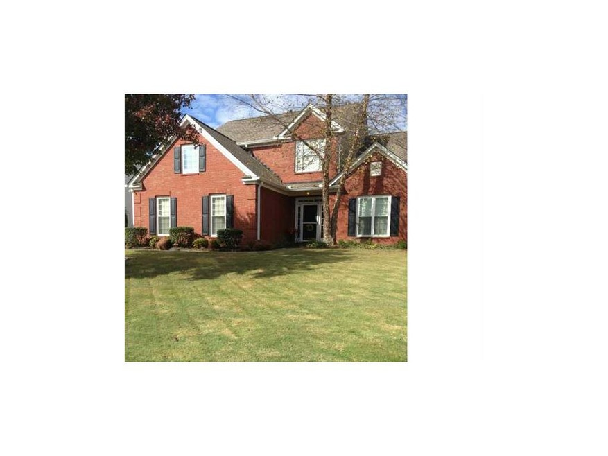 Exterior Front. Beautiful brick home with a 2 car 