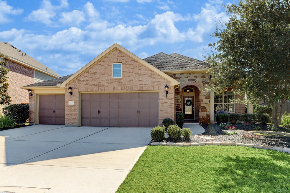 Welcome home to 12615 Spellbrook Point! Located on a waterfront lot in the Villages of Northpointe with excellent schools, this 1 and a half story home has everything you need and more!