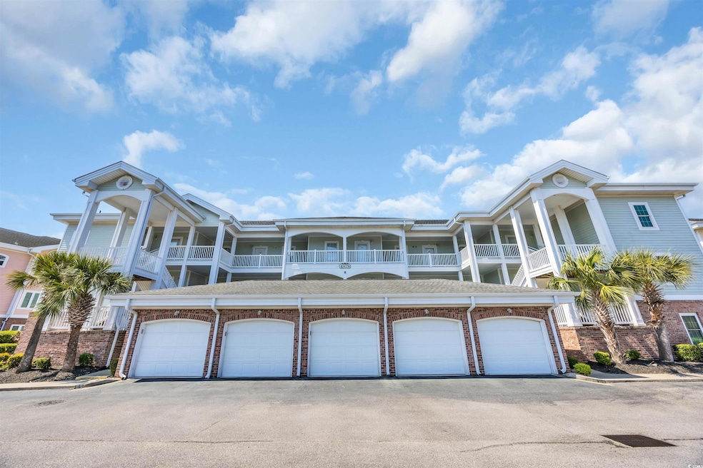 Multi unit property featuring brick siding and com