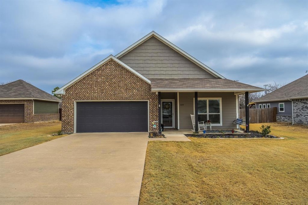 Welcome Home to 309 E Huffman!