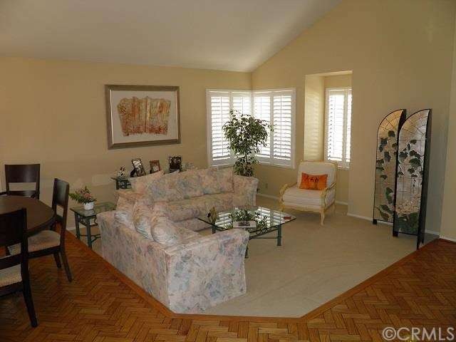 SUNKEN LIVING ROOM! CUSTOM WOOD FLOORING IN ENTRY 