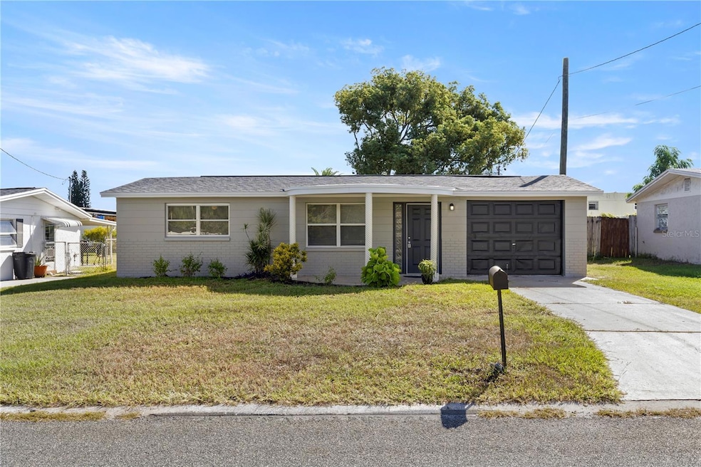 9030 Unicorn Ave, Port Richey, FL 34668 - photo 1