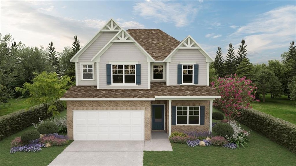 Craftsman house featuring a garage and a front law