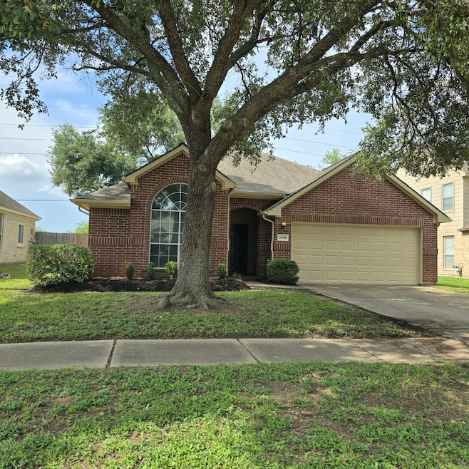 Charming brick home with a large front yard and ma
