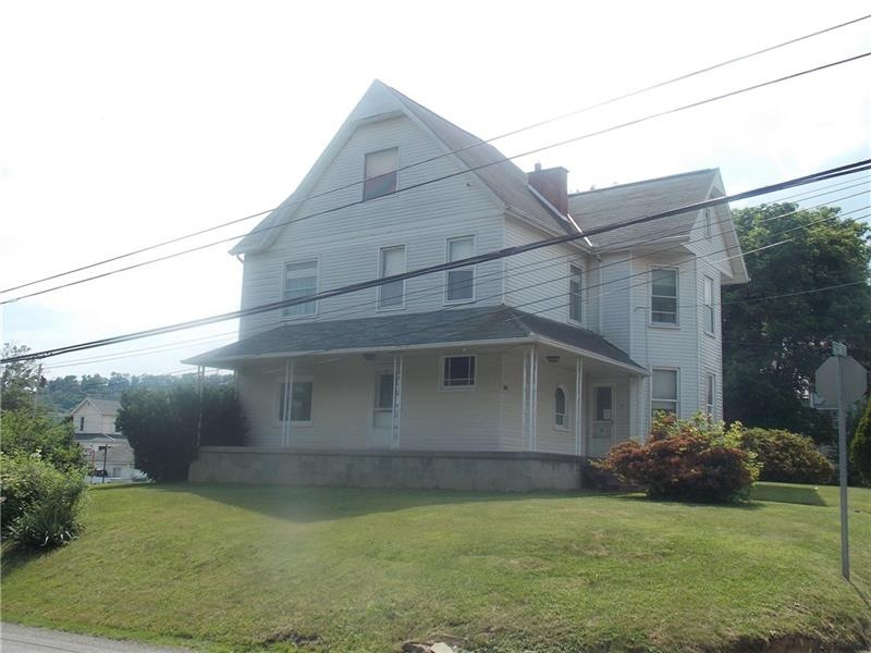 SPACIOUS HOME LOCATED ON A LARGE CORNER USABLE LOT