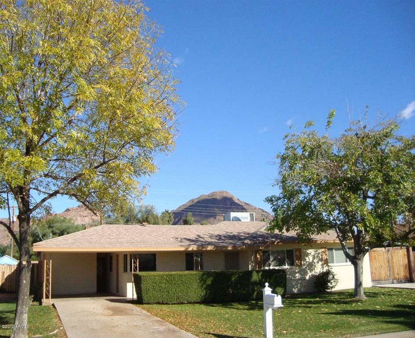 Blaise Thompson front of home