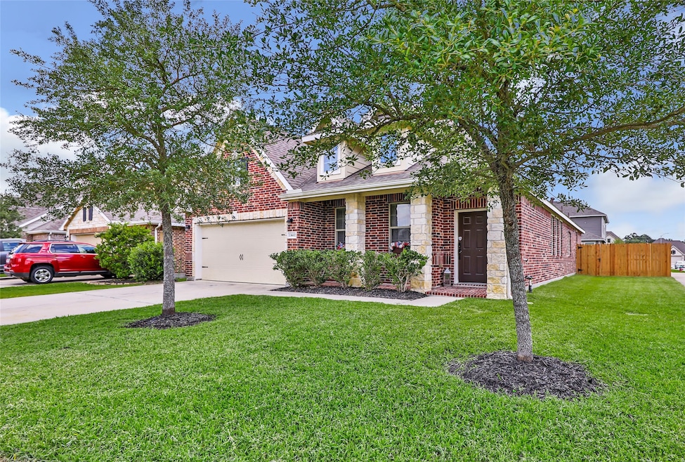 Charming brick home sits on a corner lot with a we