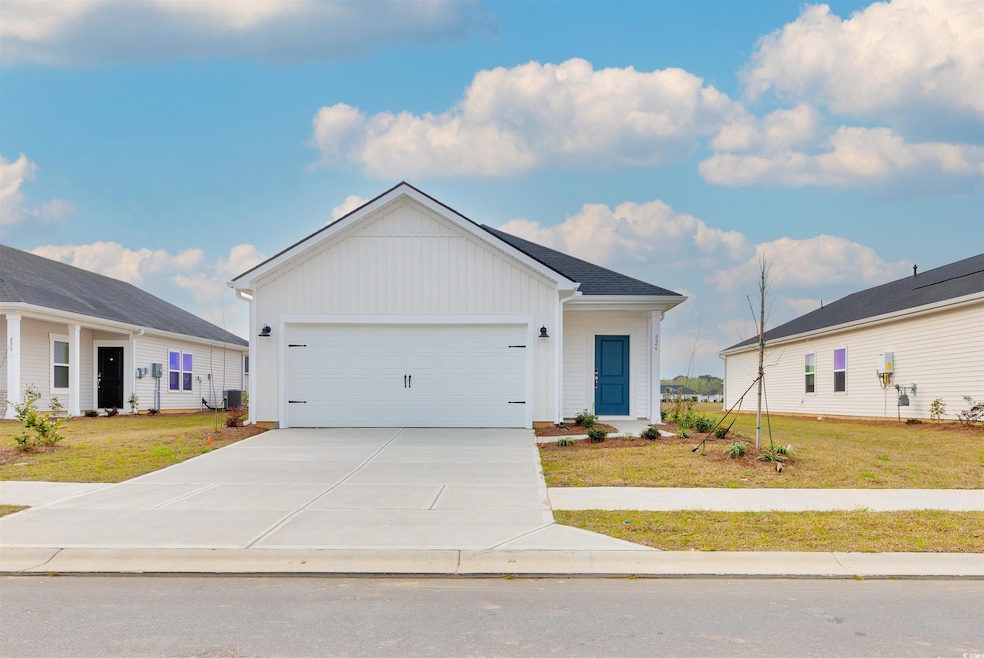 View of front of property with an attached garage,