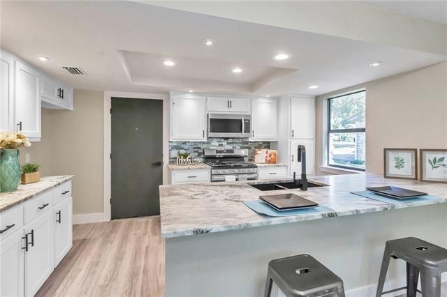 Stunning remodel with stainless steel appliances a