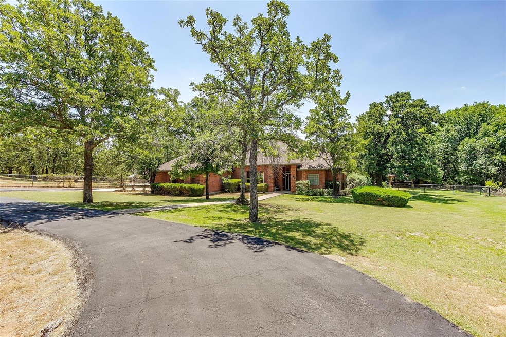 Front view of Home and paved circle drive