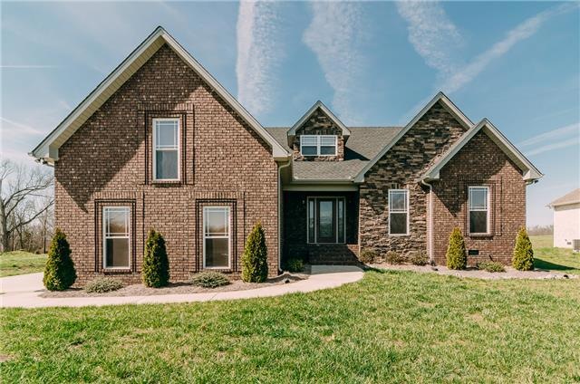 Welcome home! Custom built on 1+acre lot!