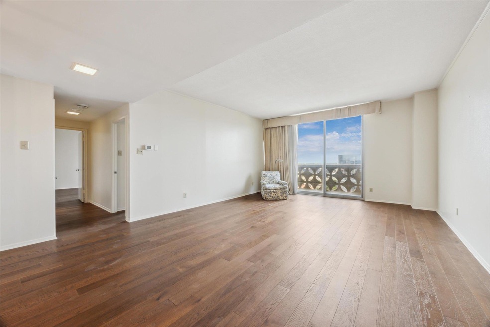 Unfurnished room with hardwood / wood-style floor