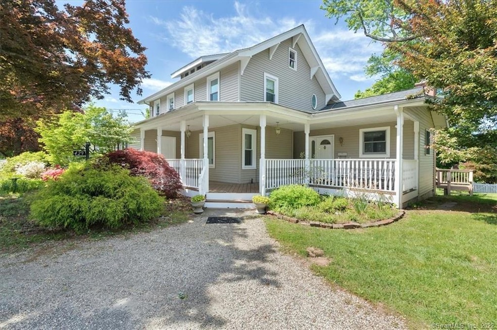Beautiful covered front porch welcomes you in
