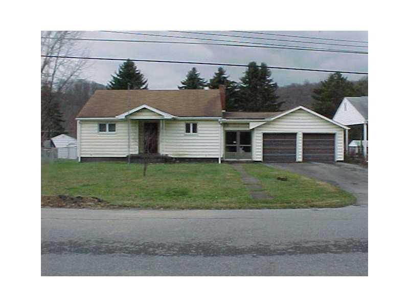 Exterior Front. Front view showing paved driveway 