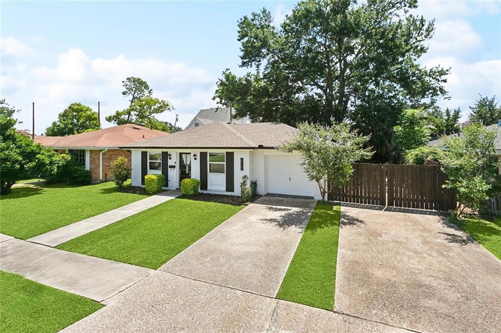 Wonderful double driveway w/rear yard access too!