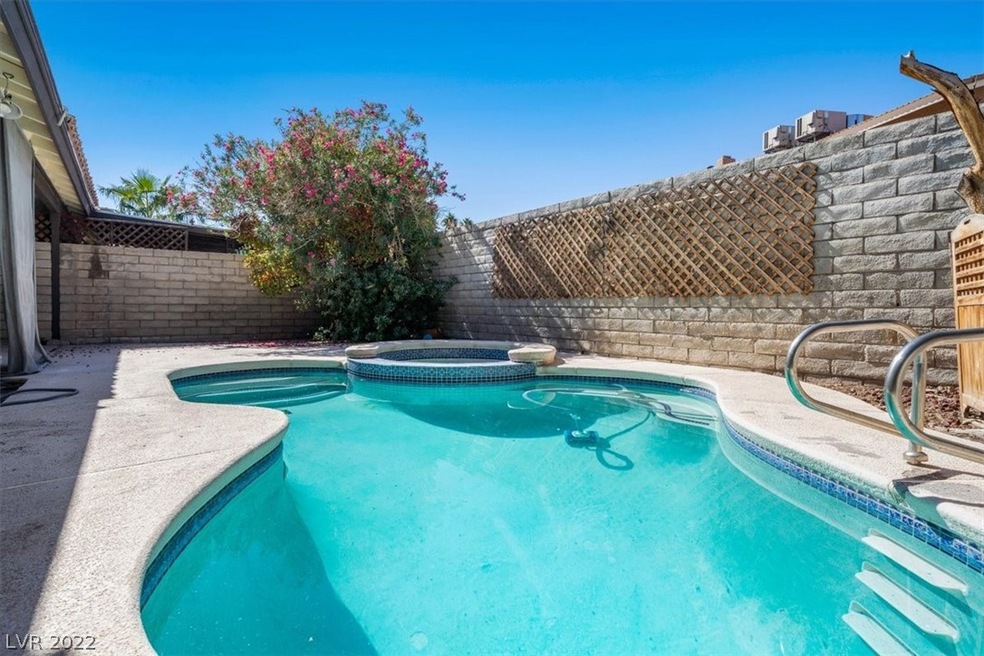 Backyard features private pool