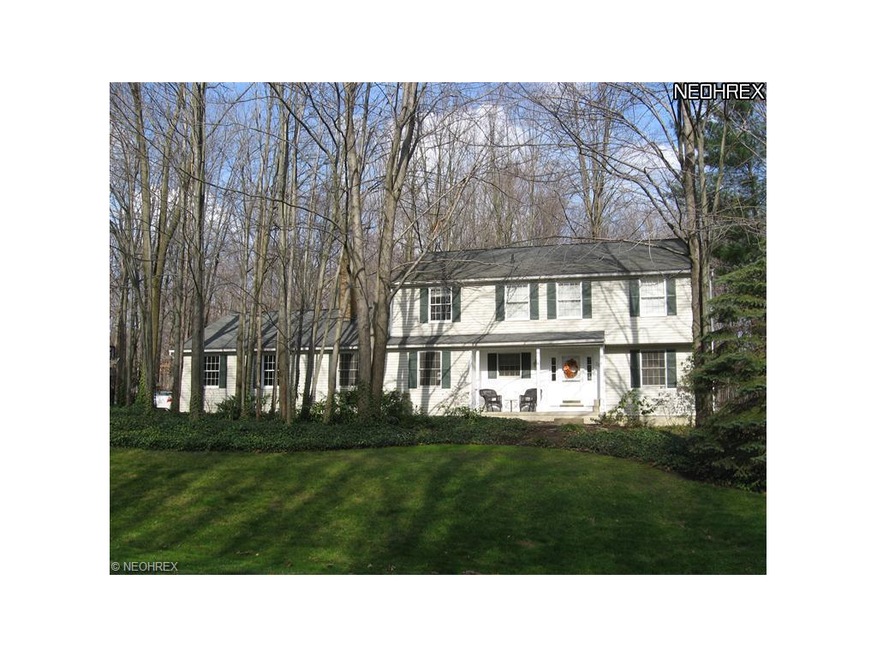 Beautifully updated colonial on large wooded lot l