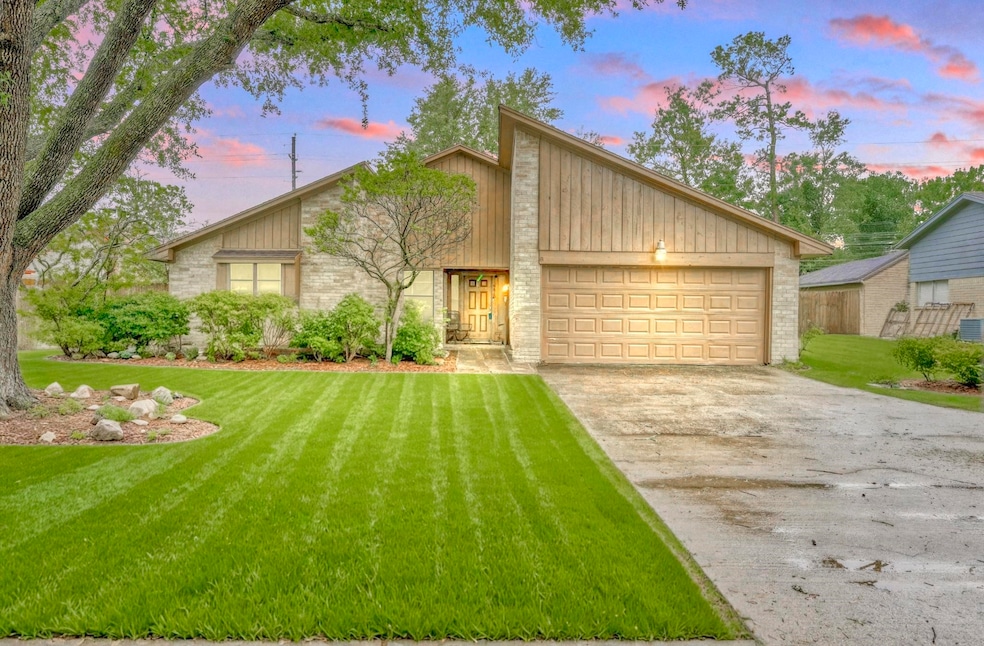 Welcome to 9810 Bayou Woods Dr, nestled in the des