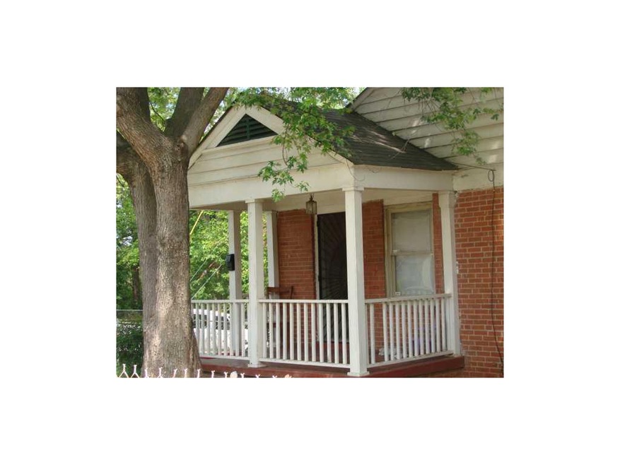 Exterior Front. Brick ranch on corner