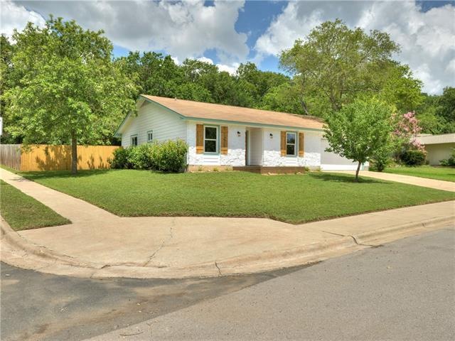 Situated on a large corner lot (over a quarter acr