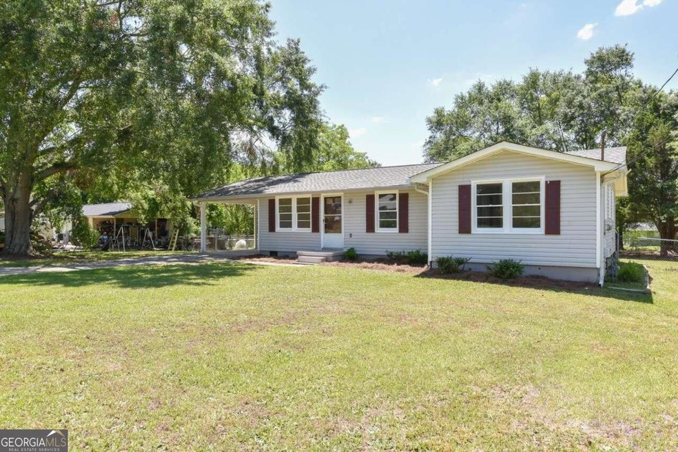 1031 Adrian Cir SW, Conyers, GA 30094 - photo 1