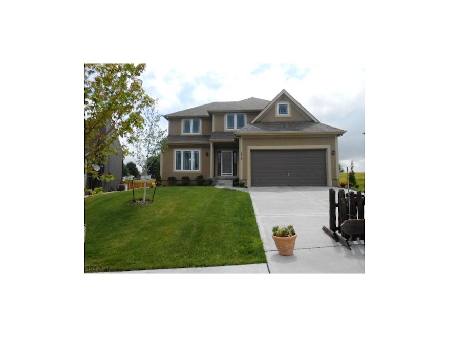 723 S Washington St, Raymore, MO 64083 - photo 1