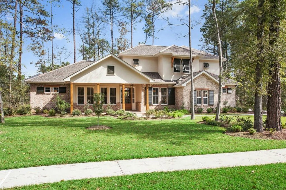 Beautiful exterior with lush landscaping.