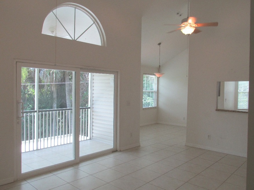 Large,bright, tiled living room, dining room, kitc