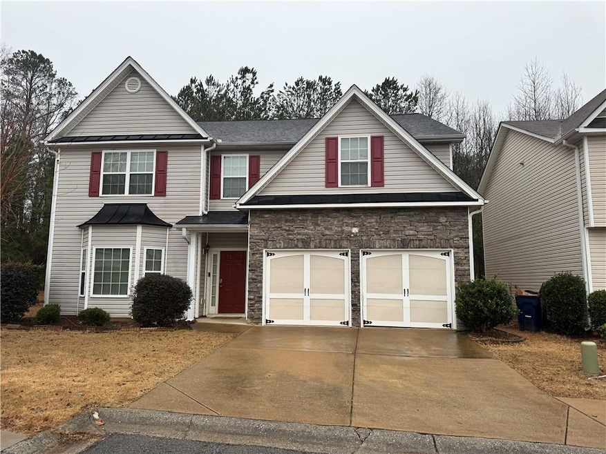 View of front facade with a garage