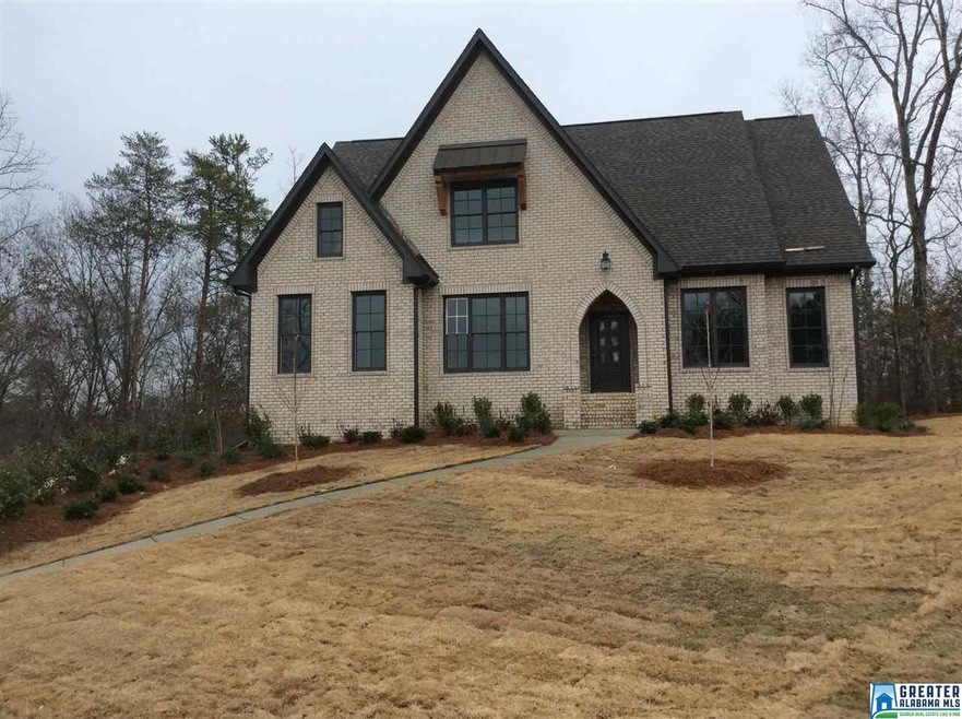 This home is in a culdesac on a large wooded lot. 