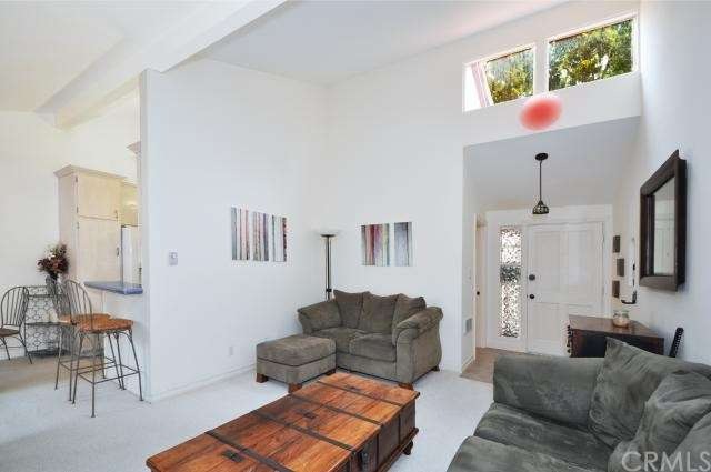 Living room to front door.
