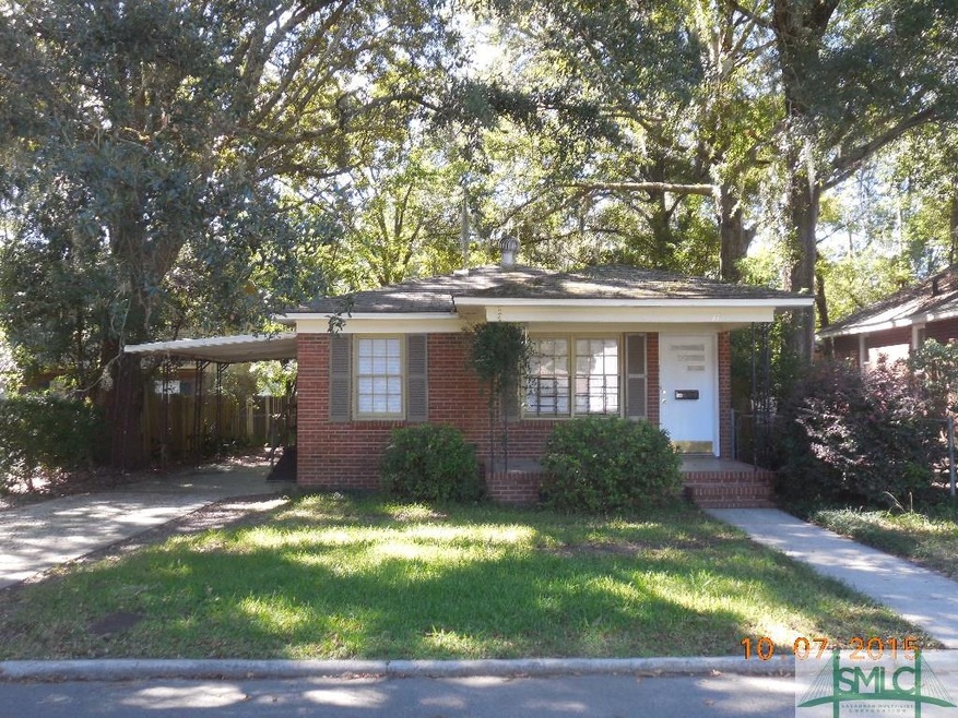 Very nice bungalow with mature tree canopy.