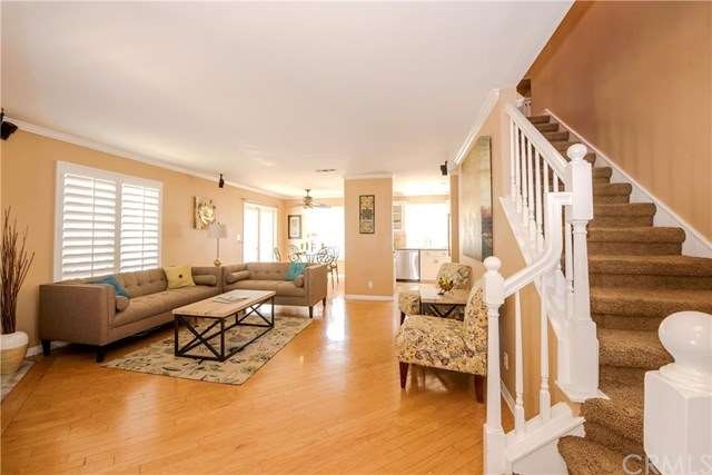 Enter into a large family/living room with lots of