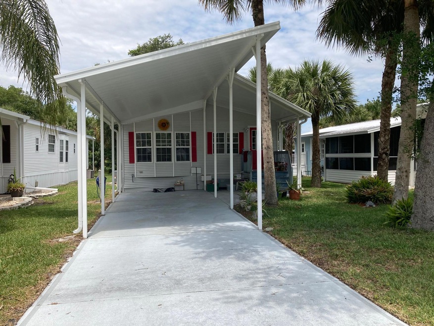 293 Plantation Dr, Titusville, FL 32780 - photo 1