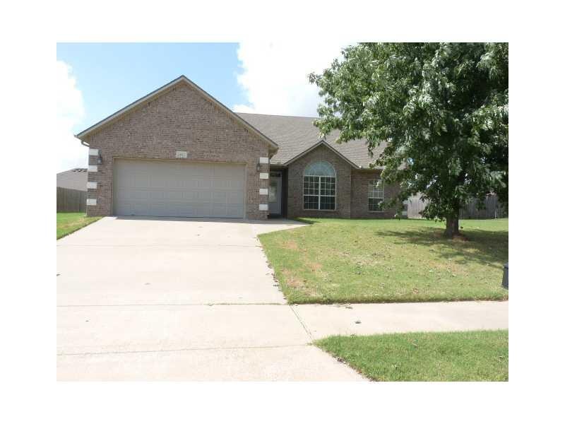 Exterior Front. Brick exterior all around and rain gutters in front and back.