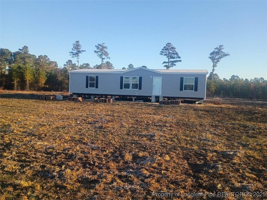 1367 Whistling Rufus Rd, Pembroke, NC 28372 - photo 1