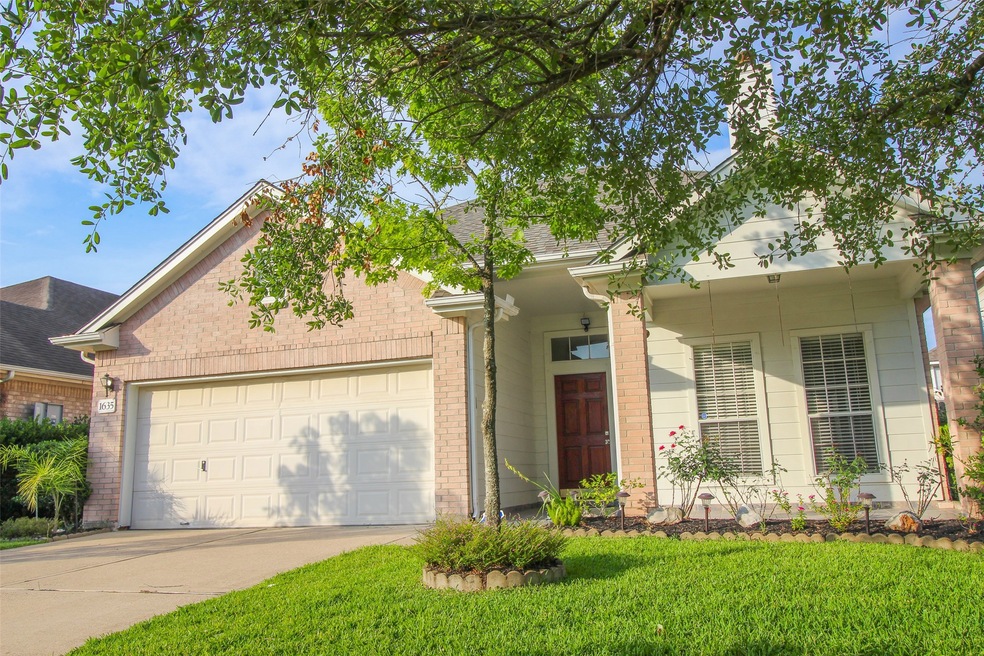 Beautifully landscaped cute looking Home from out