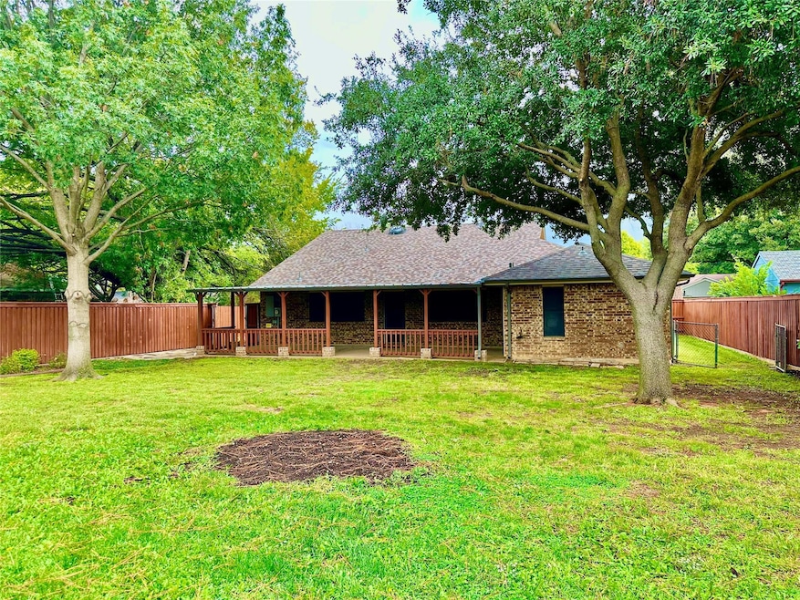 Another view of the fenced large yard with plenty of privacy