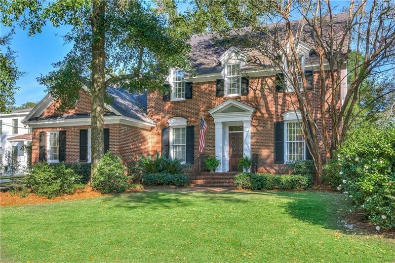 Gorgeous Federal Style home with mature hardscapes