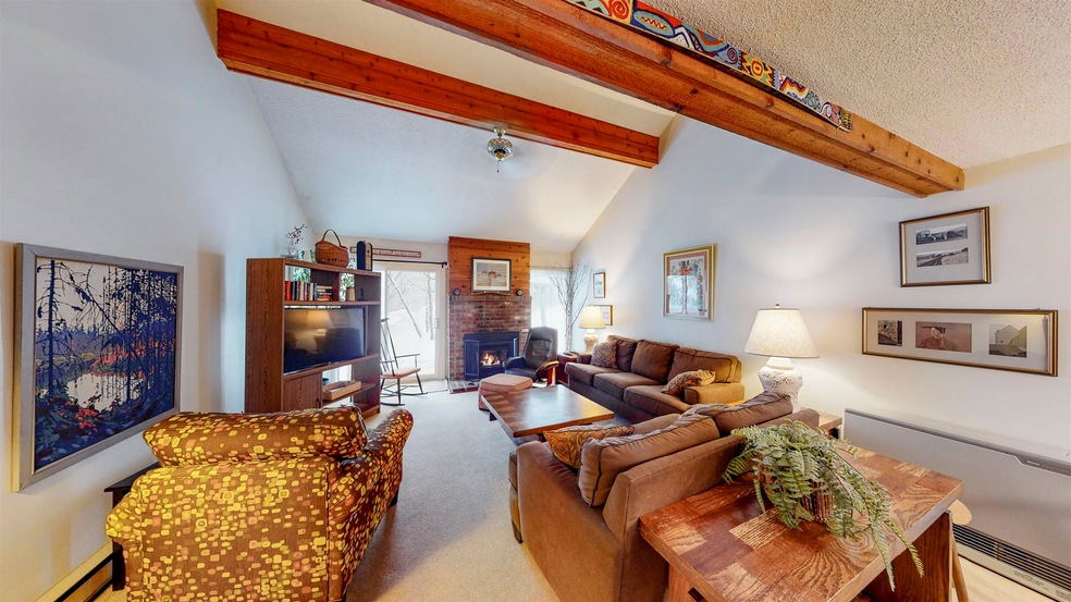 open living room with cathedral ceilings