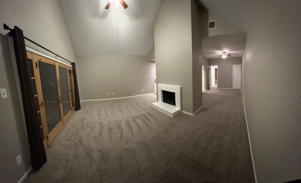 Living Area With Wood Burning Fireplace And Beauti