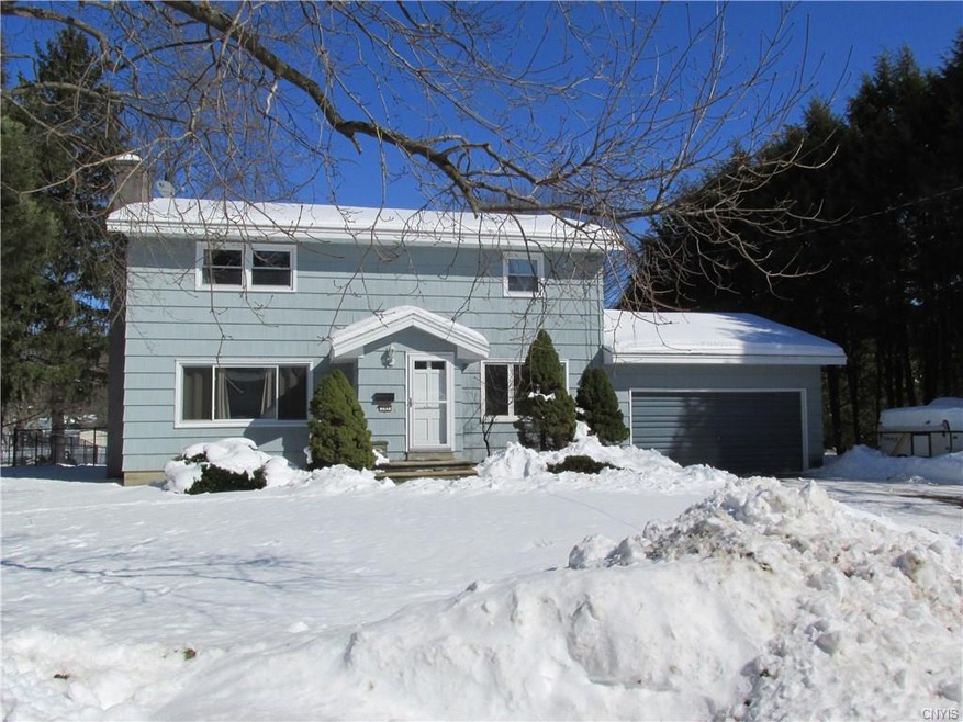 SPACIOUS CENTER HALL COLONIAL WITH IMPRESSIVE UPDA