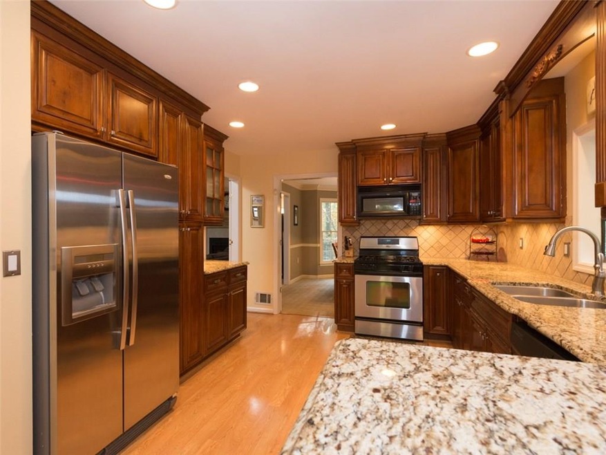You'll love this custom kitchen! Real wood cabinet