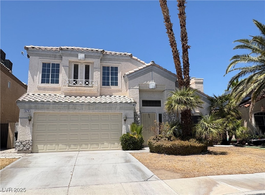 Mediterranean / spanish-style home with a tiled ro