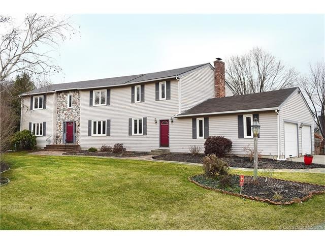 Front of home, w/ stone and clapboard