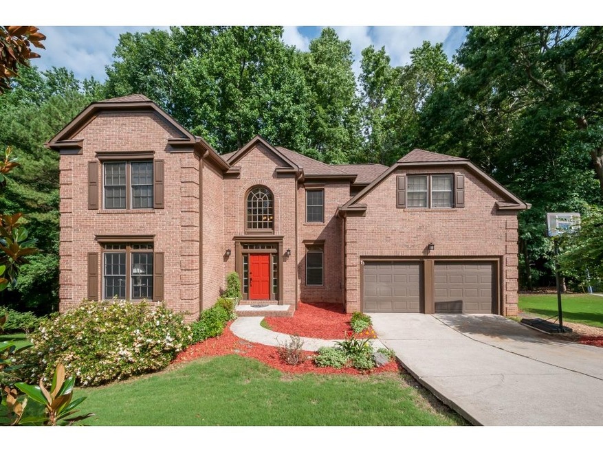 Brick front  with a level driveway