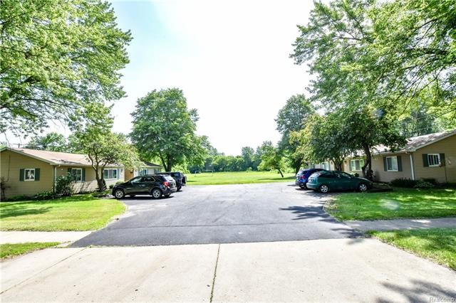 TWO DUPLEXES SOLD TOGETHER...4 UNITS